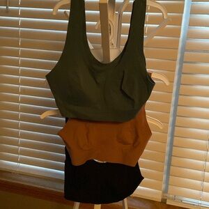 3 Aerie bras pink black and green. XS and S